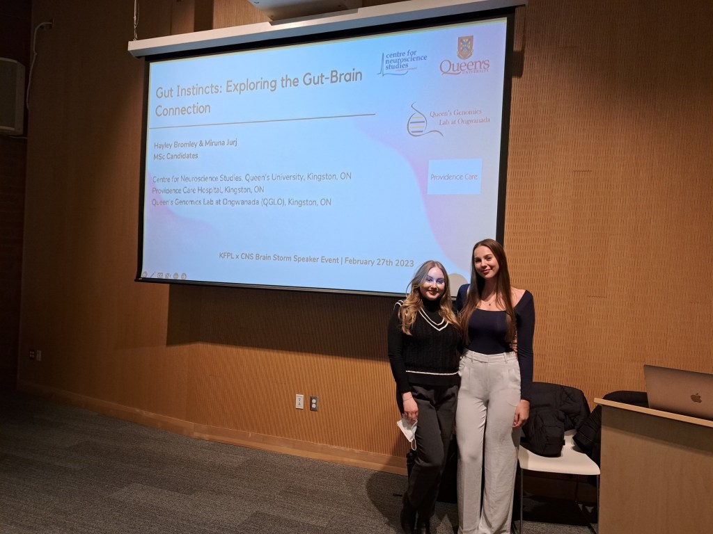 Picture of Hayley Bromley (right) presenting her research.